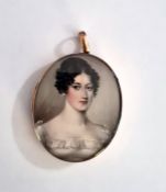 Regency portrait miniature on ivory, oval, head and shoulders of a lady in gold-coloured frame, with