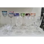 Five various flashed coloured and cut hock glasses, two other flashed coloured and cut stemmed