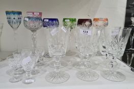 Five various flashed coloured and cut hock glasses, two other flashed coloured and cut stemmed