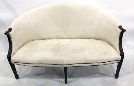 Early 20th century two-seat sofa in cream ground upholstery, reeded arm rests, on square section