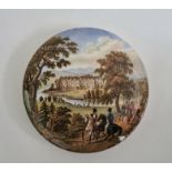 Pot lid decorated with gentleman on horseback with manor country scene to background, labelled '