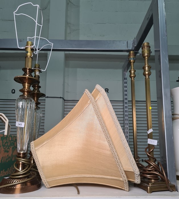 Pair of glass and brass-coloured metal table lamps in the Grecian style, a pair of brass-coloured