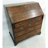 19th century oak bureau with four graduated drawers, to bracket feet, 96cm wide