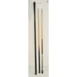 Two vintage pool cues, one one-piece (cased in black lockable tube), the other two-piece (2)