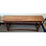 Oak bench, the rectangular top on four turned supports, block feet, stretchered base, 112cm x