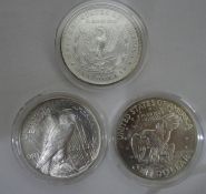 Peace dollar with Liberty to reverse, 1922 with certificate, a Morgan dollar 1889, with