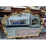 Large overmantel mirror, the shaped plate in moulded scrolling frame in the rococo manner, 90cm x