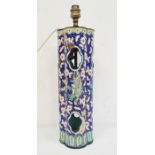 19th century cloisonne lamp decorated with coloured flowers and bamboo shoots, all on blue glaze,