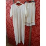 Cream silk full-length nightgown with drawn thread V-neck detail to the collar and to the sleeves,
