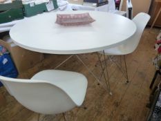 Charles and Ray Eames for Vitra, two 'DSR' chairs, white moulded shells on Eiffel-type bases and a
