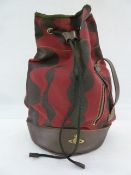 Vivienne Westwood duffel bag with drawstring, outer zip with leather fastening, leather details with