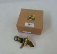 Alexandra Abraham brooch in gilt, turquoise and green, in original box, with relief decoration to