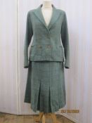 A 1940's ladies green and brown checked wool suit, labelled "Cavendish House', Cheltenham" (