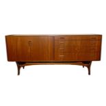 20th century Greaves & Thomas sideboard with four graduating drawers and cupboards, on stylised