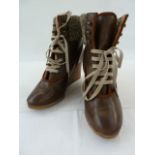 Pair of Chloe leather wedge heeled and knitted walking boots with studs and lace fastening, in