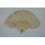 Small ostrich feather fan with bone sticks and guards, gilt decoration
