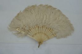 Small ostrich feather fan with bone sticks and guards, gilt decoration