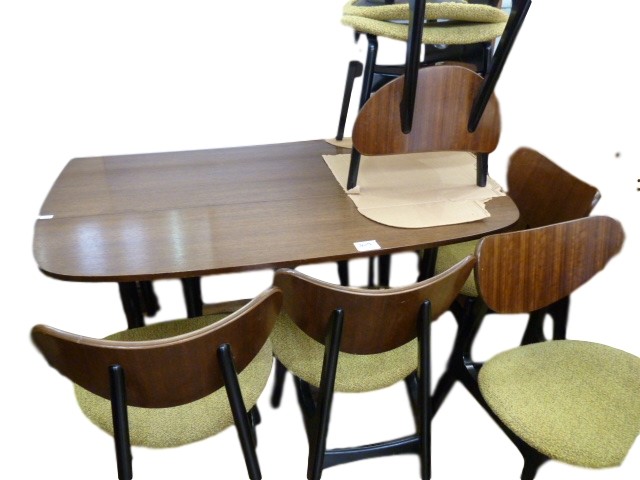 G-plan Librenza teak dining table on ebonised legs, a set of six G-plan butterfly teak and