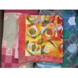 Various modern patchwork quilts, patchwork pieces and a large quantity of small remnants for