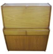 Remploy lightwood bureau with fall front enclosing pigeonholes and writing pad, drawers and