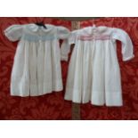 Quantity of baby dresses to include four smocked, various petticoats, a small jacket with an