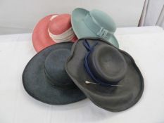 Assorted vintage hats in two hat boxes and two vintage hat boxes (4)
