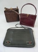 Two vintage handbags and a document case (3)