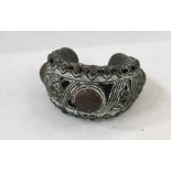 West African(?) bronze cuff bracelet, pierced decoration with circle and lozenge relief