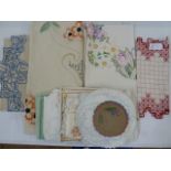 Assorted embroidered table linen to include a large embroidered linen tablecloth/throw with orange
