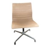 Charles Eames office chair produced by Herman Miller, with brown upholstered seat, marked to base,