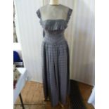 Thea Porter evening dress in pale purple, boned bodice, with a drop waist, full skirt and a silk