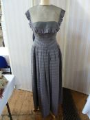 Thea Porter evening dress in pale purple, boned bodice, with a drop waist, full skirt and a silk