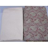 Vintage style paisley patterned quilt, double,  in red, green and beige and another cream-coloured
