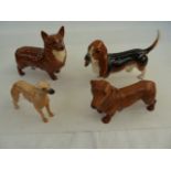 Beswick model of a corgi, a Beswick model of a bassett hound, a dachshund and a lurcher (4)