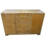 20th century oak sideboard, probably by Gordon Russell, with four central drawers, one bearing