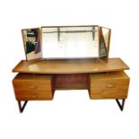 1967 G-Plan bed teak bedroom suite comprising three-door wardrobe with two sliding and one opening