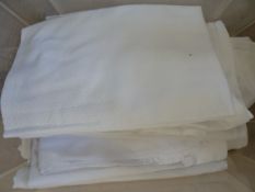 Quantity of tablecloths to include damask and two white double bedcovers (1 box)