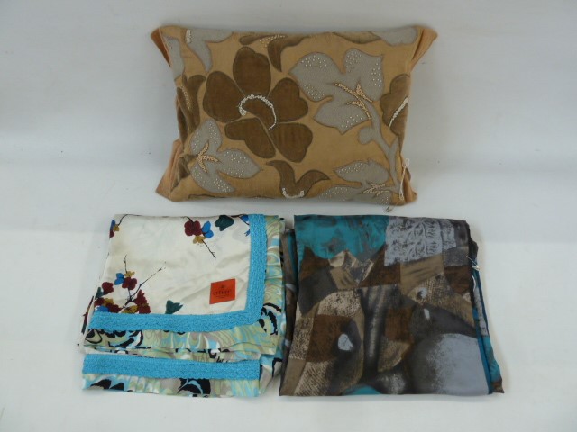 Two silk scarves and an appliqued cushion embroidered with faux-seed pearls and gold thread (3)