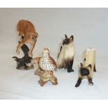 Model of a Siamese cat, another seated, a Beswick model of a Thrush, a 'The Defender' hand-painted