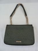 Moschino, Love Moschino black leather bag with gilt chain and leather strap handles, red lining,