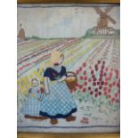 Early 20th century embroidery depicting mother and child among tulip field, with windmill in