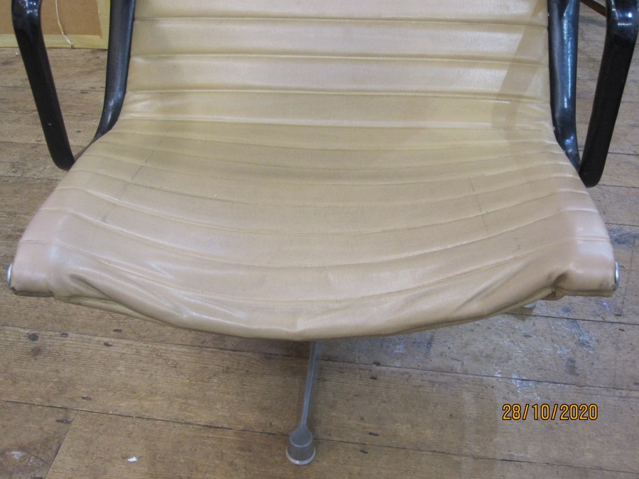 Charles Eames lounge chair produced by Herman Miller, labelled to underside, with cream - Image 7 of 7