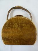 1950's metal evening bag labelled 'Meritor', fitted with two metal matching cases for make-up