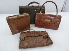 Four various vintage crocodile handbags to include a Gladstone-style bag and three others (4)