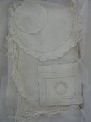 Large quantity of embroidered and white-work table linen including crocheted and lace-edged, cut and