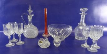 Dartington glass bowl of wrythen circular form, a slab cut decanter, an orange glass vase and