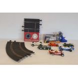 Quantity of Scalextric to include track, model car, boxed, loose models and remotes (1 box)