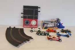 Quantity of Scalextric to include track, model car, boxed, loose models and remotes (1 box)