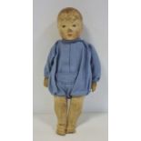 Early 20th century straw stuffed cotton doll with painted face, 36cm long