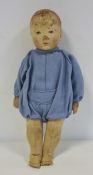 Early 20th century straw stuffed cotton doll with painted face, 36cm long